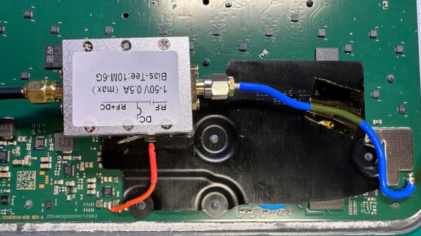 A bias tee module added inside the Starlink terminal, connected to the pads where a GPS antenna used to be wired